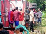 Mobil Box terbalik